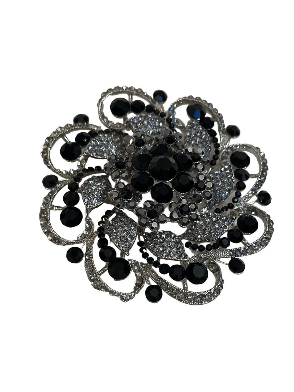 Intricate Black and Silver Floral Brooch with Sparkling Stones
